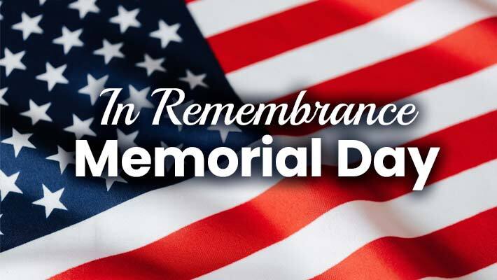 In Remembrance: Memorial Day is written on an American flag background.