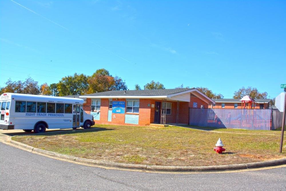 Preschool building with bus in front